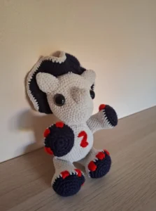 Peluche dinosaure - vue de côté
